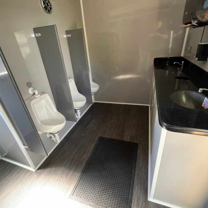 10-stall-wedding-restroom-trailer-nashville-tn-rental-inside-male-urinals